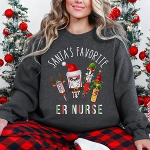 Santas' Favorite ER Nurse Sweatshirt, Weihnachten Krankenschwester Pullover, Pflege Hoodie, Krankenschwester Weihnachten Sweatshirt, Notaufnahme, ER Nurse Crewneck