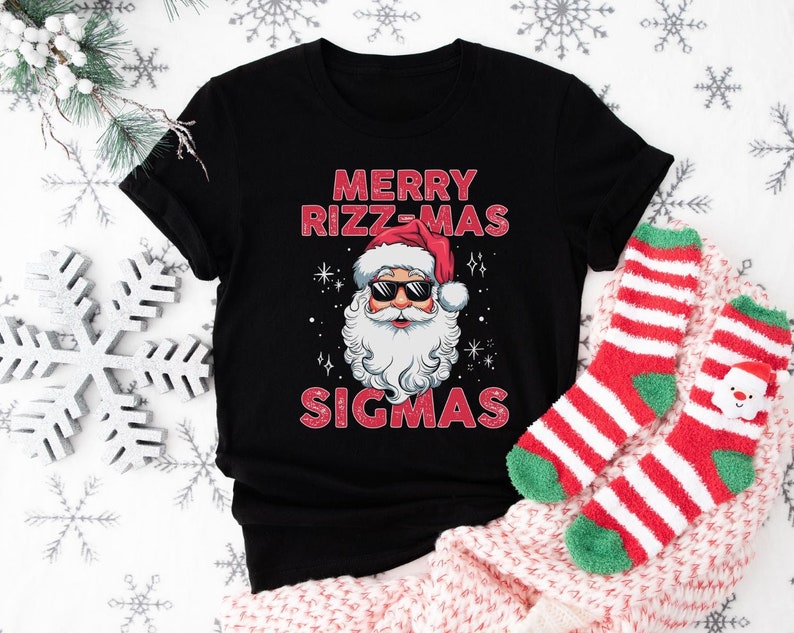 May include: Black t-shirt with a red and white illustration of Santa Claus wearing sunglasses and the text "Merry Rizz-Mas Sigmas".