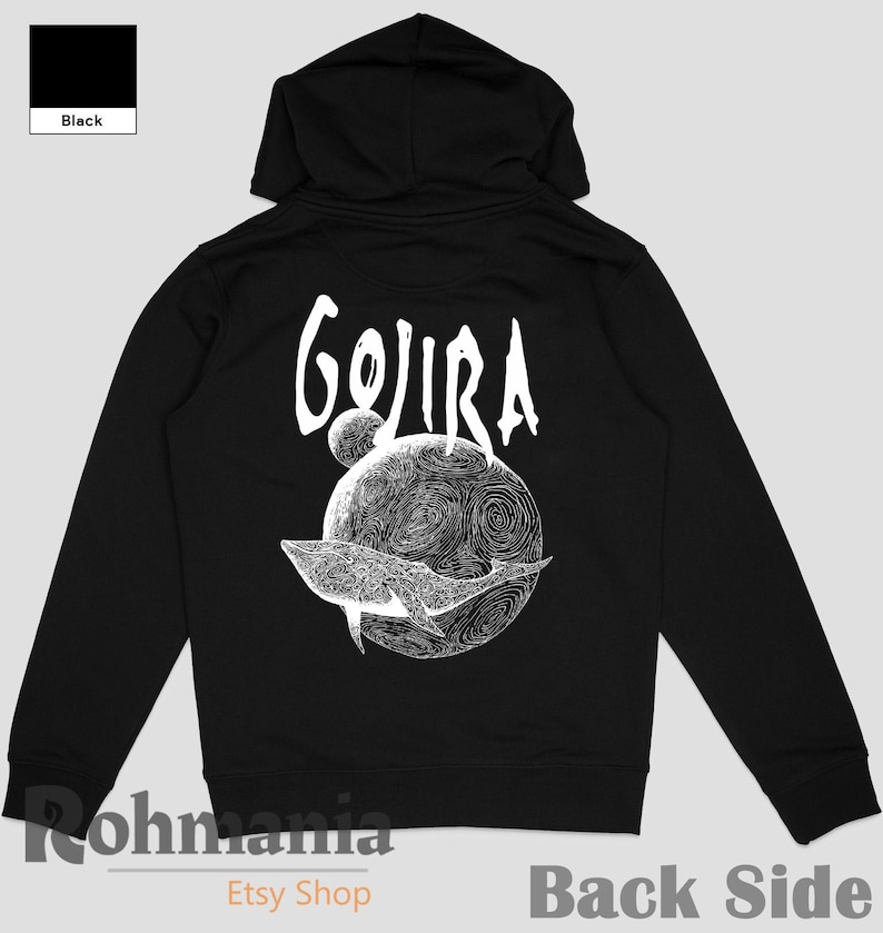 May include: Black hoodie with a white graphic on the back. The graphic features the word "Gojira" above a detailed illustration of a whale swimming around a planet. The hoodie has a hood and a front zipper.