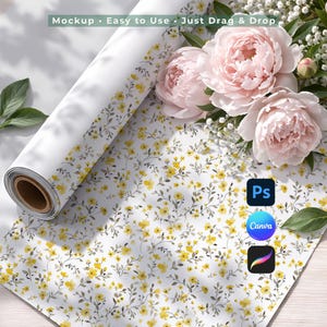 May include: A roll of white floral patterned paper with yellow flowers and green leaves. The paper is next to pink peonies and greenery. The text "Mockup • Easy to Use • Just Drag & Drop" is at the top. Software icons for Photoshop, Canva, and Procreate are visible.