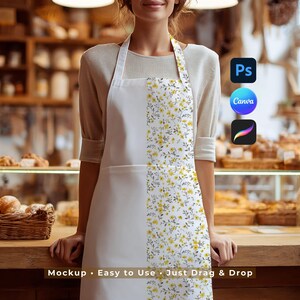 May include: White apron with a floral design of yellow flowers and green leaves. The apron has a white bib and straps. The text "Mockup • Easy to Use • Just Drag & Drop" is at the bottom. The image also shows the logos for Photoshop, Canva, and Procreate.