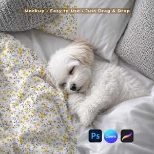 May include: A white bed sheet featuring a small yellow floral pattern with green leaves, with a small white dog sleeping on top. The image includes the text Mockup • Easy to Use • Just Drag & Drop, along with icons for Photoshop, Canva, and Procreate.