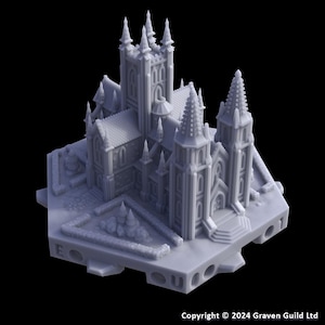 May include: A detailed, light gray miniature model of a cathedral with multiple spires, towers, and architectural details. The model includes a courtyard and is set against a black background. Copyright 2024 Graven Guild Ltd is visible.
