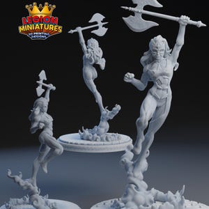 May include: Three white 3D-printed figurines of a female warrior holding a battle axe. The figures are in dynamic poses, with one figure standing on a circular base. The logo for Legion Miniatures is in the top left corner.