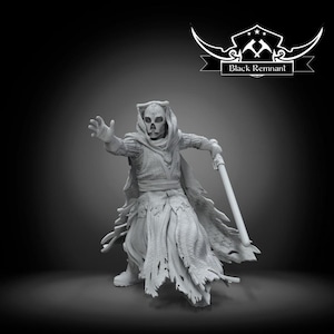 May include: A gray figurine of a skeletal figure in tattered robes, holding a staff. The figure has a skull-like face and is wearing a hooded cloak. The text "Black Remnant" is displayed above the figure.