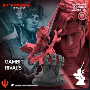 Puede incluir: Figura 3D impresa en rojo de Gambit Rivals, que representa a un personaje con un bastón. El fondo muestra una ilustración azul y roja de la cara de un hombre. El texto "GAMBIT RIVALS" es visible. También está el logotipo de Trident Studio.