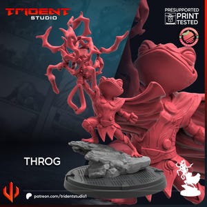 Puede incluir: Miniatura roja impresa en 3D de un personaje con forma de rana, "Throg", en pose heroica, sosteniendo un arma. La figura está sobre una base rocosa con una plataforma circular. El logotipo de Trident Studio y el texto "Presupported Print Tested" son visibles.