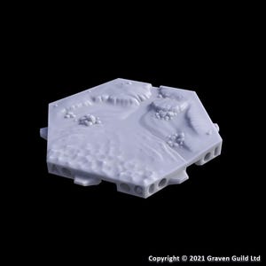 May include: A light gray, hexagonal terrain tile with a textured surface, featuring raised areas and small holes along the edges. The tile has a detailed, uneven surface, suggesting a landscape. The copyright notice at the bottom reads "Copyright © 2021 Graven Guild Ltd".