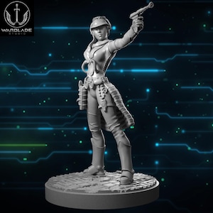 May include: A gray figurine of a female character in a futuristic outfit, holding a blaster pistol. The figure is standing on a circular base with a detailed surface. The Wardlade Studio logo is in the upper left corner.
