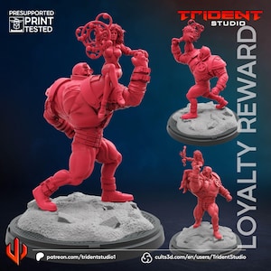 Puede incluir: Figuras rojas impresas en 3D de un personaje musculoso sosteniendo a una mujer, con una base rocosa. La imagen incluye el texto "TRIDENT STUDIO" y "LOYALTY REWARD". Las figuras están pre-soportadas y probadas para impresión.