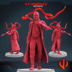 May include: A red monochromatic figurine of a character wearing a long coat and pants, holding a spear with a flowing red translucent energy effect. The text TRIDENT STUDIO is visible at the top. The figure stands on a circular base.
