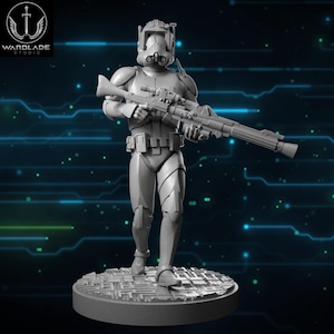 May include: A gray, 3D-printed figurine of a clone trooper from Star Wars, holding a blaster rifle. The figure is standing on a circular base with a textured surface. The Wardlade Studio logo is in the upper left corner.