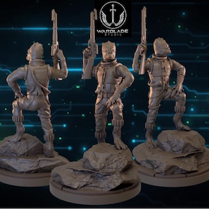 May include: Three gray figurines of a humanoid alien soldier holding a rifle, posed on rocky terrain. The figures are wearing armor and standing on circular bases. The Wardlade Studio logo is visible in the top center.