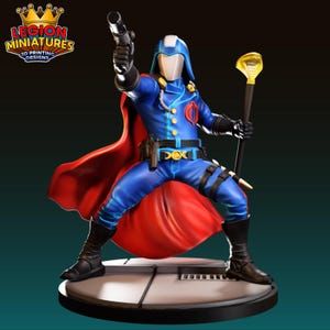 May include: A blue and red action figure of a character holding a gun and a staff. The figure is wearing a blue uniform with a red cape. The figure is standing on a round platform. The logo "LEGION MINIATURES 3D PRINTING DESIGNS" is in the upper left corner.