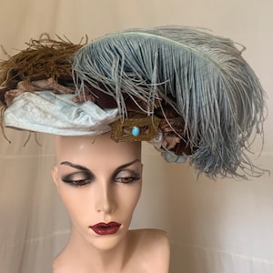 1910s hat with brown and  gray ostrich  feathers