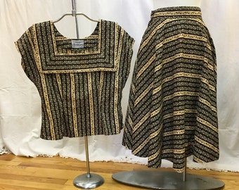 1950s, 36" bust, 2 piece cotton print ensemble of gold and black floral print.
