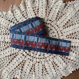 70 inches of Cherry Ribbon