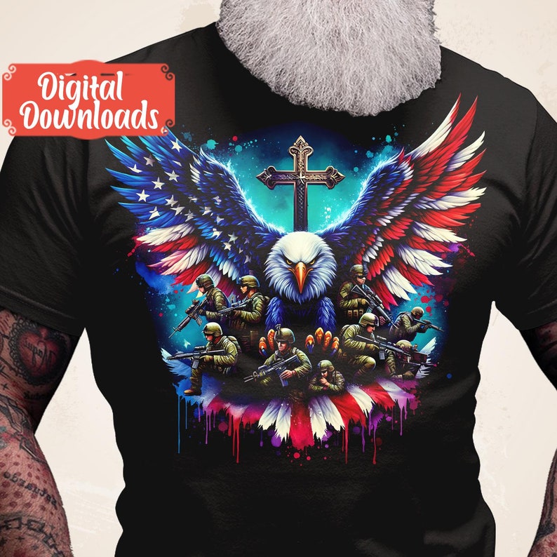 May include: A black t-shirt featuring a graphic of a bald eagle with American flag wings, a cross, and soldiers holding rifles. The eagle is surrounded by a colourful watercolour effect.