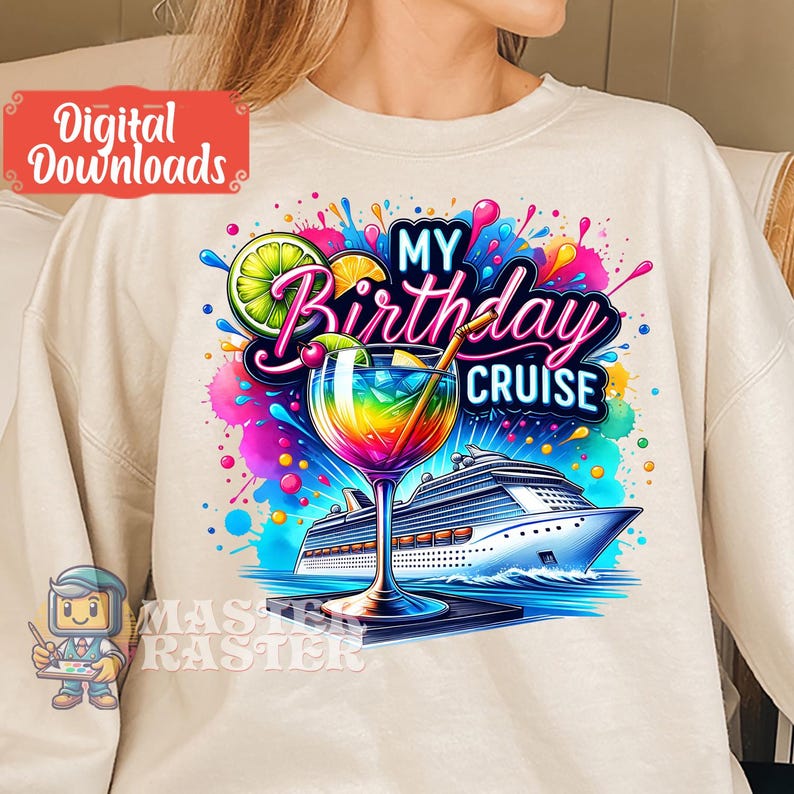May include: A white sweatshirt with a colorful graphic design featuring a cocktail glass with a rainbow drink, a cruise ship, and the text "My Birthday Cruise".