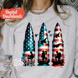 May include: Three bullet casings with the American flag design. Each casing has a silhouette of a soldier holding a rifle and a jet fighter plane flying above. The background is a watercolor wash of red, white, and blue.