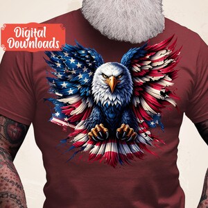 May include: A red t-shirt with a graphic of an American bald eagle with its wings spread out, forming the shape of the American flag.