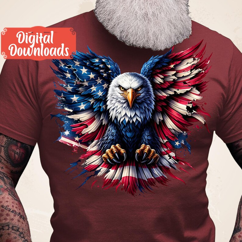 May include: A red t-shirt with a graphic of an American bald eagle with its wings spread out, forming the shape of the American flag.