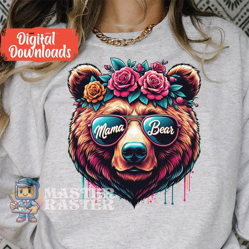 May include: A colourful illustration of a bear wearing sunglasses with the words "Mama Bear" on the lenses. The bear is wearing a flower crown with pink, red and yellow flowers.