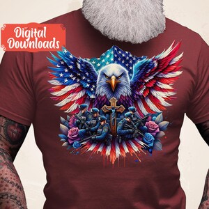 May include: A red t-shirt with a graphic of an American bald eagle with wings spread, holding a cross. The eagle is superimposed over an American flag. Five police officers are standing in front of the eagle, holding guns. The graphic is surrounded by flowers.