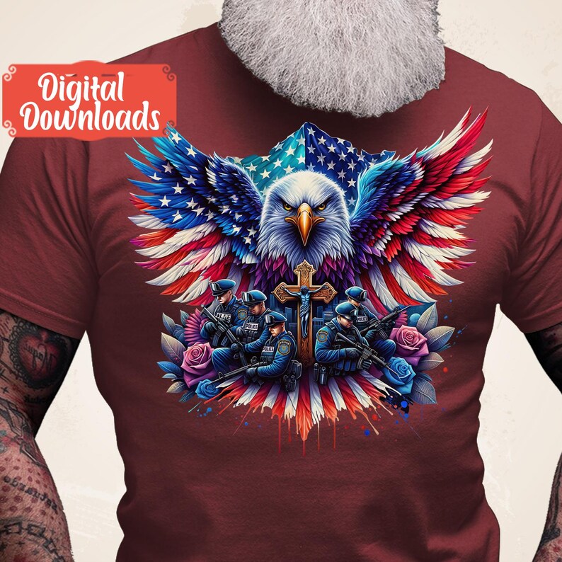 May include: A red t-shirt with a graphic of an American bald eagle with wings spread, holding a cross. The eagle is superimposed over an American flag. Five police officers are standing in front of the eagle, holding guns. The graphic is surrounded by flowers.