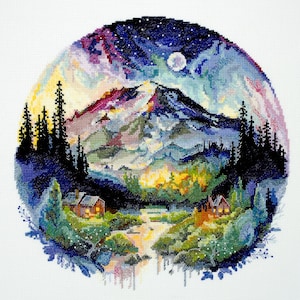 May include: A cross-stitch embroidery depicting a mountain scene with two small cabins in the foreground. The mountain is covered in snow and the sky is filled with stars and a full moon. The colours are vibrant and include shades of blue, purple, pink, and yellow.