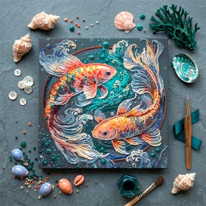 May include: A square canvas art piece featuring two koi fish in a yin-yang composition, surrounded by waves. The fish are orange, red, and blue, with detailed beadwork. Seashells, buttons, and coral are arranged around the artwork.