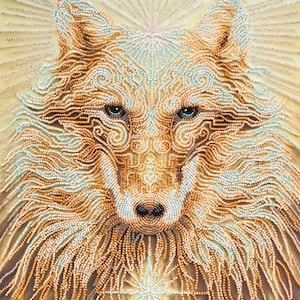 May include: A close-up of a wolf's face made of beads. The wolf's fur is a mix of light brown, gold, and white beads. The wolf's eyes are blue and the nose is black.
