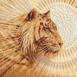 May include: A close-up of a tiger's face made of beads. The tiger is facing to the right and has a golden brown color. The background is a light brown with a white beaded design.