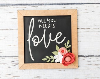 All you need is love sign with felt flowers