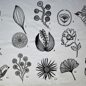 May include: Black and white line drawings of various floral and bird designs. The designs are numbered 1 through 15.