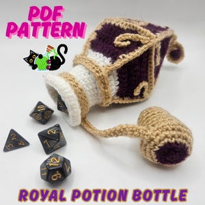 Text reads: Royal Potion Bottle. Pictured is a diamond-shaped potion bottle with gold accents and details and a gold charm, a large cork is attached and inside are polyhedral gaming dice.