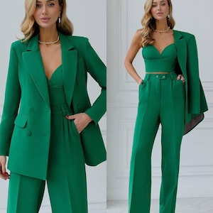 elegant women's pantsuit. classic three-piece suit. classic green suit. suit for business events. three-piece trouser suit
