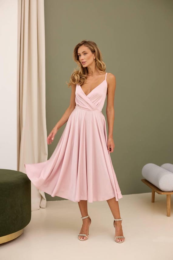 Silk dress with a Sun skirt.Backless dress with straps.Silk dress with straps.Large palette of colors.Wedding Guest Dress.Bridesmaid Outfit Silk dress with a Sun skirt.Backless dress with straps.Silk dress with straps.Large palette of colors.Wedding Guest Dress.Bridesmaid Outfit