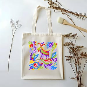 Eine Einkaufstasche im folkloristischen Stil mit einem Blumen- und Ziegenmuster Baumwollsegeltuch-Einkaufstasche für Einkaufstouren Stilvolles Accessoire für Spaziergänge