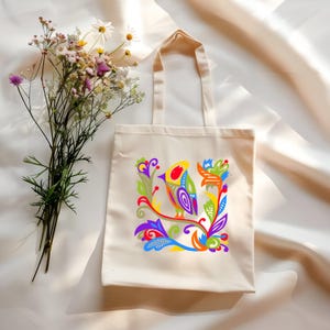 Eine Einkaufstasche im folkloristischen Stil mit einem Blumen- und Vogelmuster Baumwollsegeltuch-Einkaufstasche für Einkaufstouren Stilvolles Accessoire für Spaziergänge