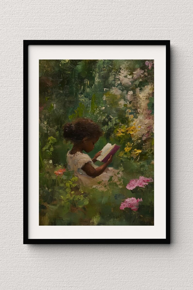 May include: A young girl with dark brown hair sits in a garden, reading a book. She is wearing a white dress and is surrounded by green foliage and pink flowers.