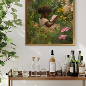 May include: A painting of a young girl sitting in a garden, reading a book. The girl is wearing a white dress and has dark hair. The garden is filled with flowers and greenery.