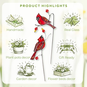 Handmade stained glass cardinal plant stakes used as decorative accents in indoor plants and cozy home interiors.
