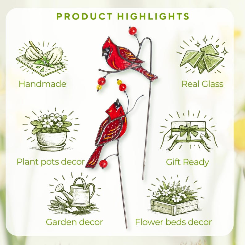 Handmade stained glass cardinal plant stakes used as decorative accents in indoor plants and cozy home interiors.