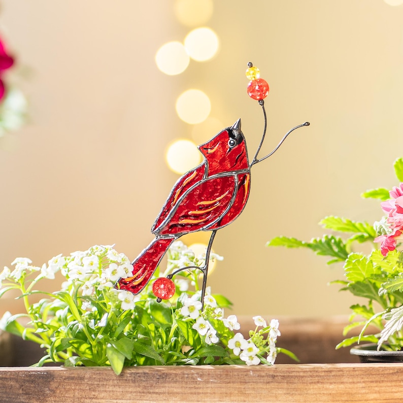 stained glass red birds in planter