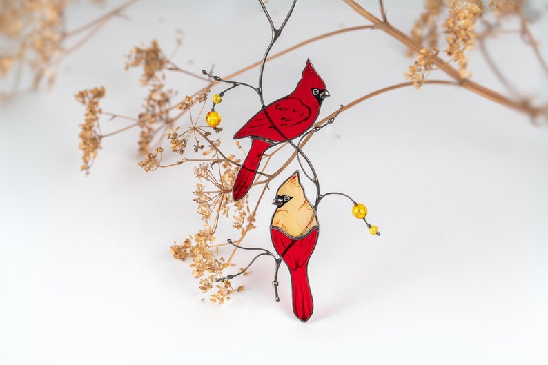 Stained glass cardinals as a minimalistic decor for home