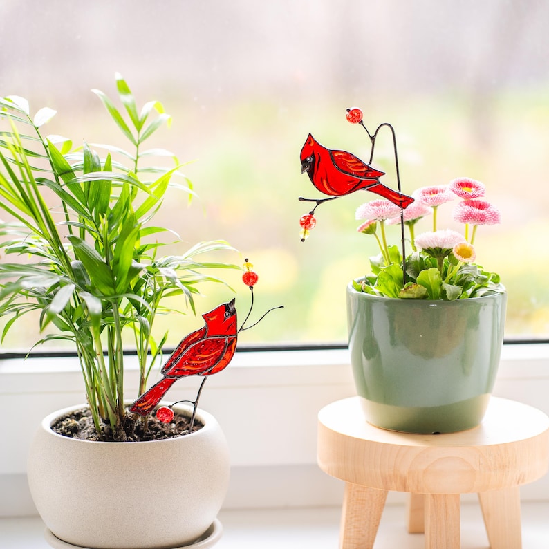 bird plant stakes in green indoor plant