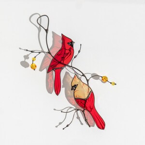 Cute pair of cardinals made of stained glass