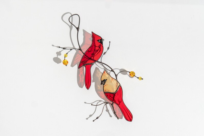 Cute pair of cardinals made of stained glass