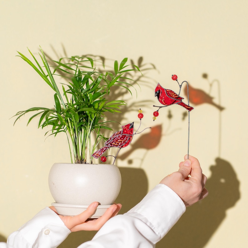 red cardinal bird decoration in indoor plant